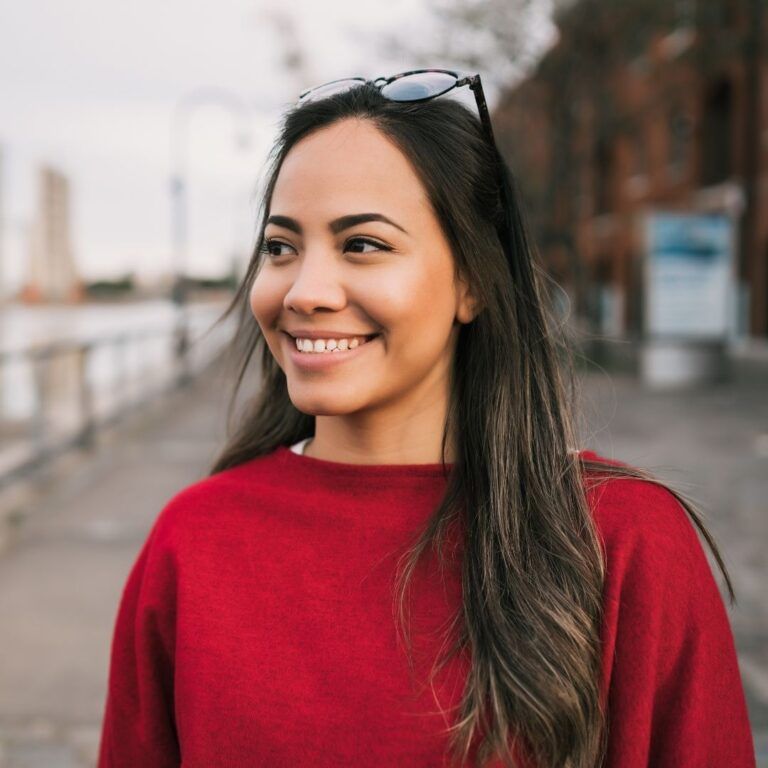 A woman with a healthy menstrual cycle, ovulation, and periods.