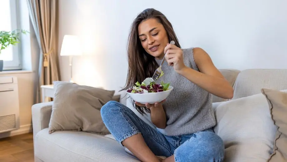Woman preparing foods that support liver health and detoxification